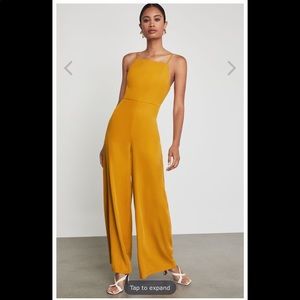 BCBG Strappy Wide Leg Jumpsuit in Mustard Yellow